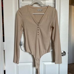 Tan/pink long sleeve bodysuit